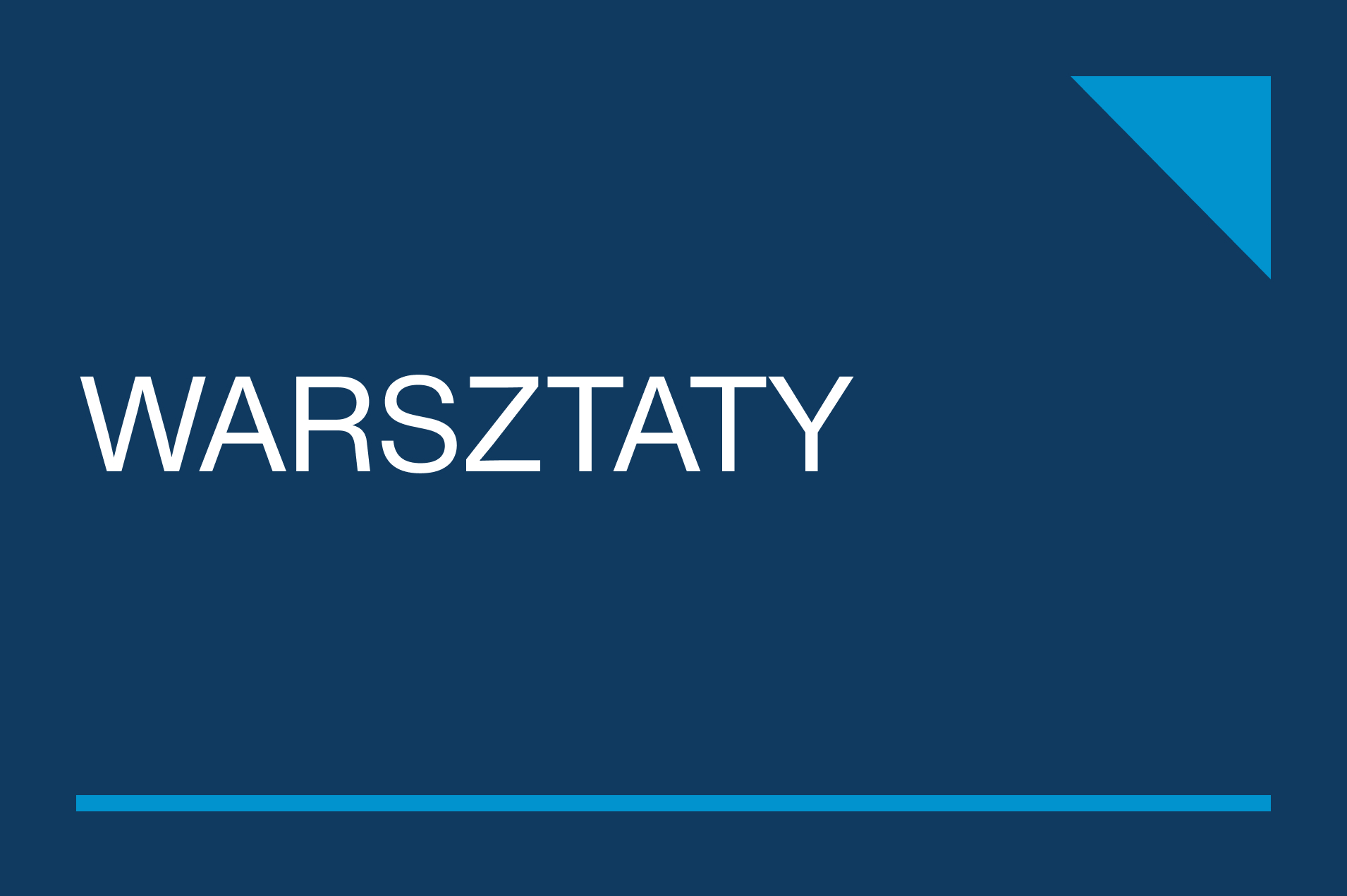 Plansza z napisem warsztaty